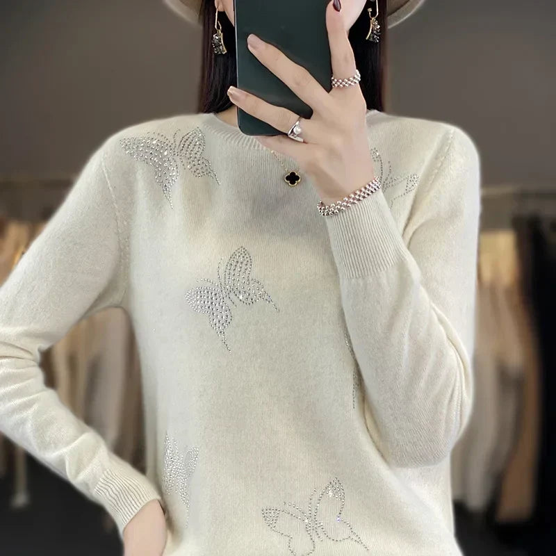 Sweter damski ze zdobieniem w motyle