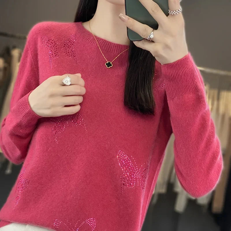 Sweter damski ze zdobieniem w motyle