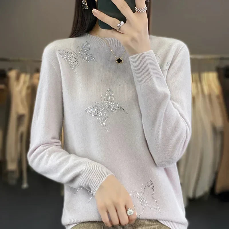 Sweter damski ze zdobieniem w motyle