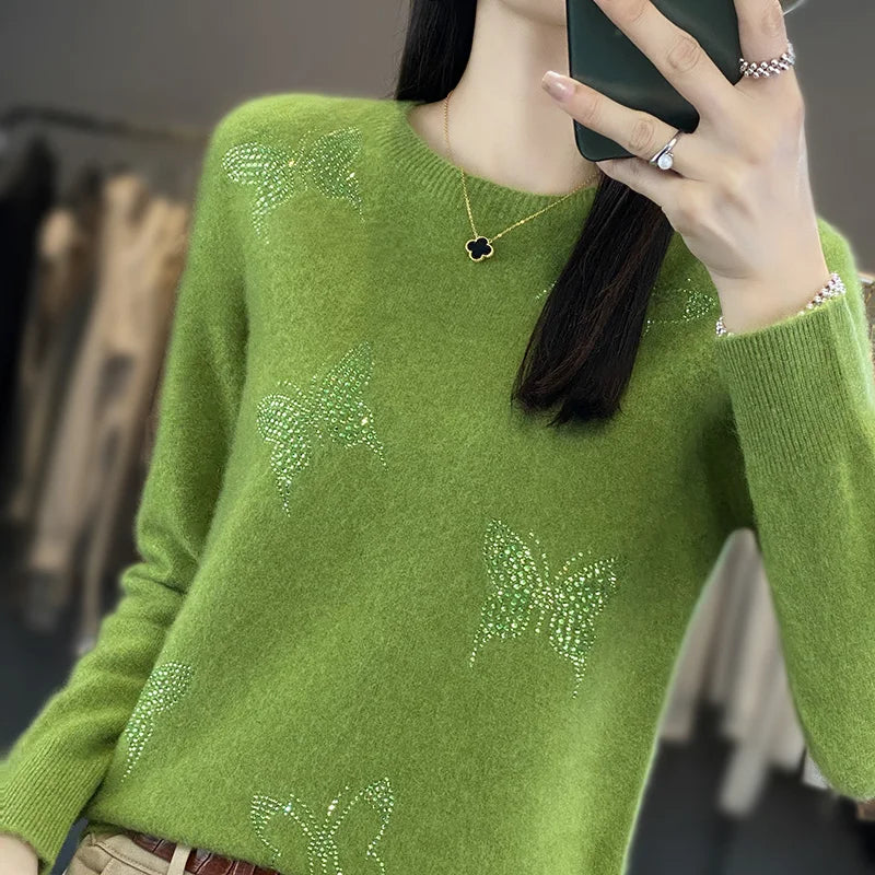 Sweter damski ze zdobieniem w motyle