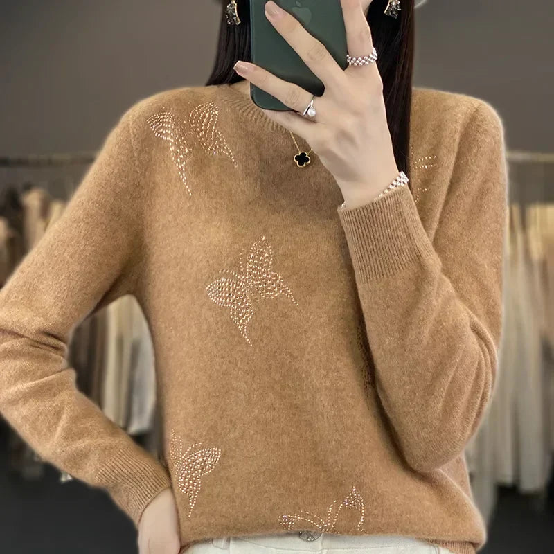 Sweter damski ze zdobieniem w motyle