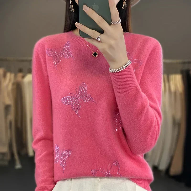 Sweter damski ze zdobieniem w motyle